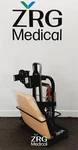 Mizuho Ultra Shoulder Positioner Ref 5358 W/ Cart & New Pads 5345. Fixed Price $500.00.