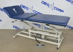 Armedica AM-300 Hi-lo Three Section Treatment Table W/ Footswitch. Fixed Price $1095.00.