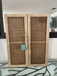 Kate And Laurel Ori Rattan 2-DOOR Wall Cabinet 22X28. Fixed Price $350.00.