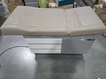 Midmark Ritter 104 Exam Table - Gray/beige Scratch & Dent. Fixed Price $811.52.