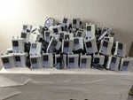 Lot Of 97 Baxter Sigma Spectrum Infusion Pump W/ Ac Adapter And Pole Clamp. Fixed Price $3200.00.