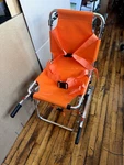 LINE2DESIGN Ems Emergency Evacuation Stair Chair 4 Wheel Model 70005-O Orange. Fixed Price $175.00.