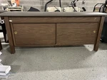 Medical Treatment Table With Sliding Cabinet Doors. Fixed Price $175.00.