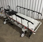 Stryker 1001 IPX2 Pedal Hydraulic Stretcher Deteriorated Rubber Wheels No Bed. Fixed Price $883.97.