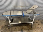 Pedigo Stainless Steel Mortuary Stretcher Table W/ Rails & Shelf. Fixed Price $1020.00.