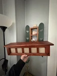 Beautiful Wooden Shelf With Picture Frames Wall Hanging. Fixed Price $60.00.
