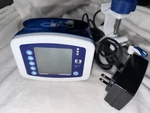 Kangaroo Joey Feeding Pump W/ Pole Clamp & Power Adapter. Fixed Price $150.00.