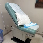 Umf 500 Ob/gyn Medical Examination Table With Stirrups, Foot Pedal Control. Fixed Price $400.00.