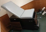 Midmark Medical 104 Exam Table With Stirrups. Fixed Price $200.00.