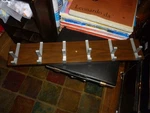 1960S Hook Walnut Color And Alum, Mid-century Coat Rack 34" X 6". Fixed Price $200.00.