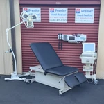 Exam Tables For Sale Clinton 84438-34 Bariatric Power New Black Upholstery. Fixed Price $1810.00.